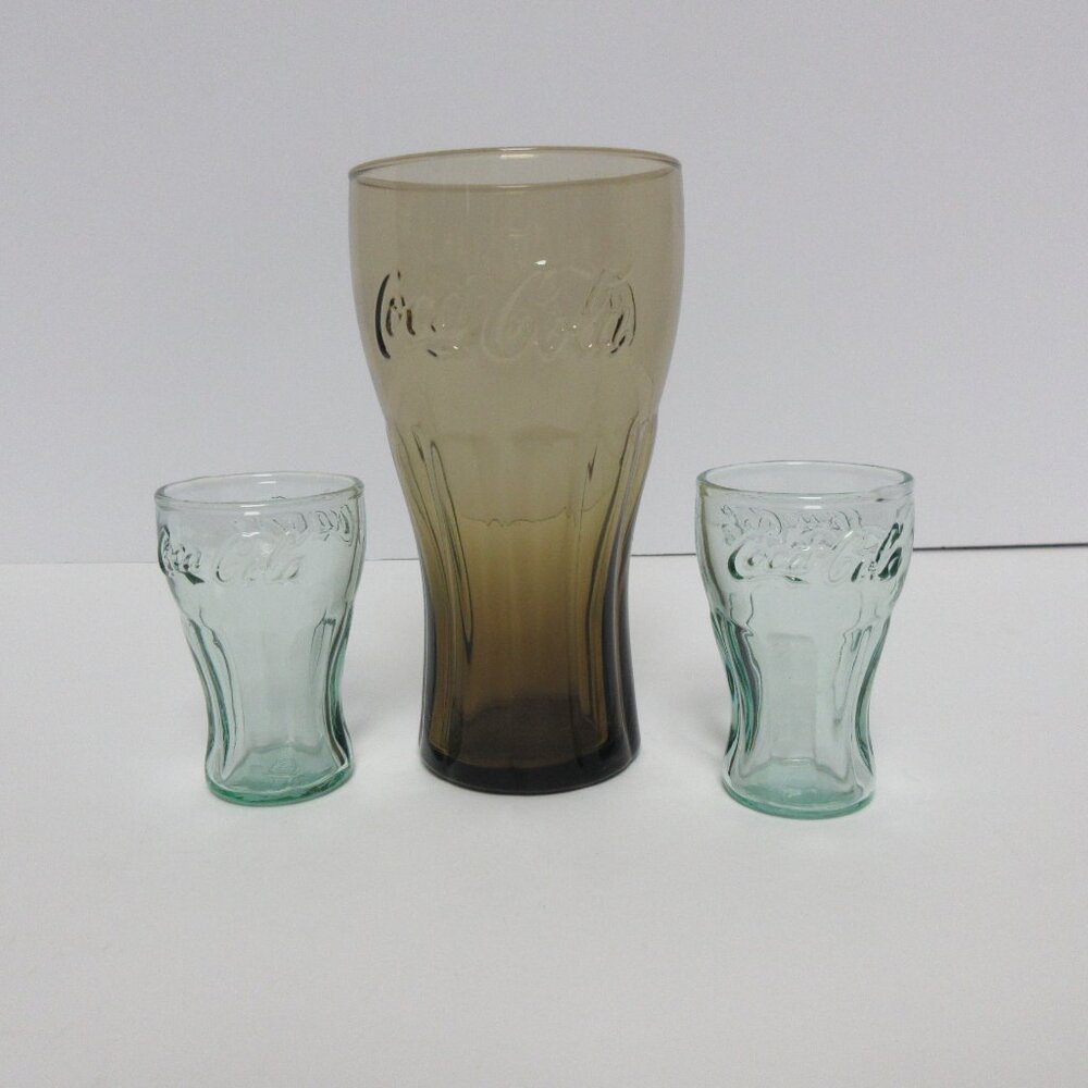 Set of 3 Cocacola glasses (1) 6 inch brownish tint (2) mini 3 inch greenish tint